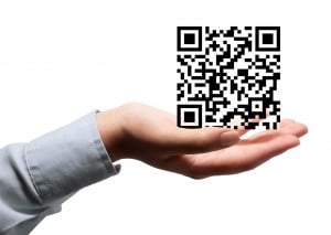 QR code and man's hand