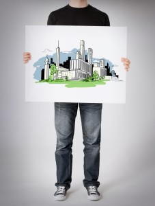 person holding architectural drawing